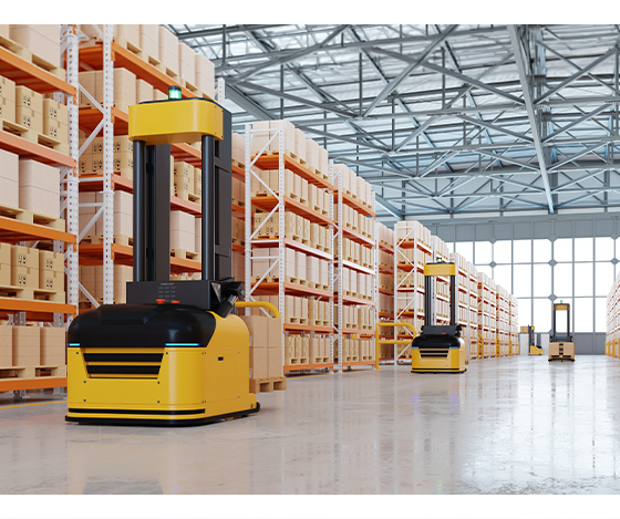 Automated guided vehicles moving pallets through a warehouse storage area